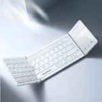 SmartDevil Tri-Fold Wireless Bluetooth Keyboard with built-in touchpad shown in a folded position, featuring a compact portable design for laptops, tablets, smartphones, and travel.
